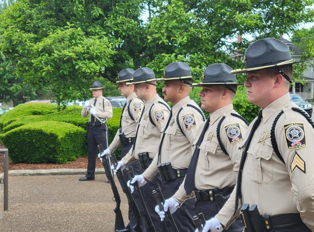 Deputies standing in Honor Guard Gear in a line